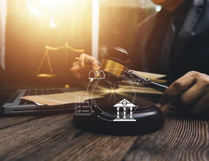 justice-and-law-concept-male-judge-in-a-courtroom-on-wooden-table-and-counselor-or-male-lawyer-working-in-office-legal-law-advice-and-justice-concept-free-photo